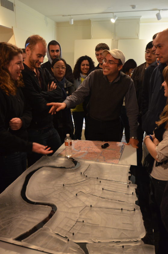 Richard Campanella discusses the hydraulic model with the Gutter to Gulf studio, Longue Vue House & Gardens.